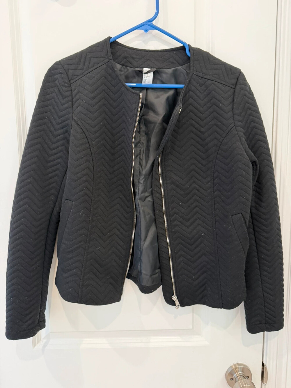 Divided quilted black jacket